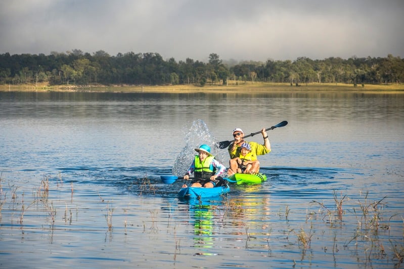 Family kayaking on Somerset Dam