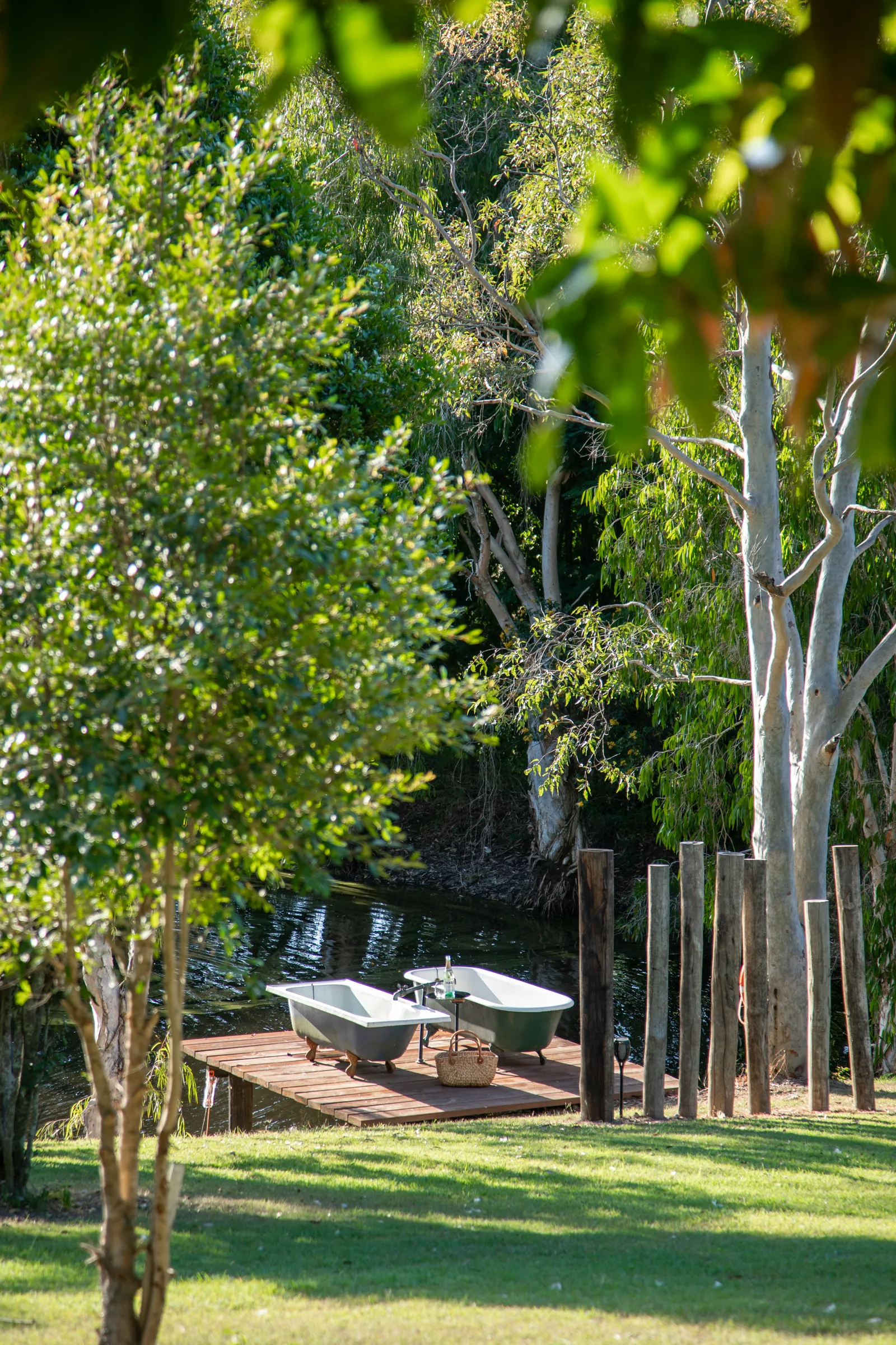 Outdoor baths on the deck beside the dam