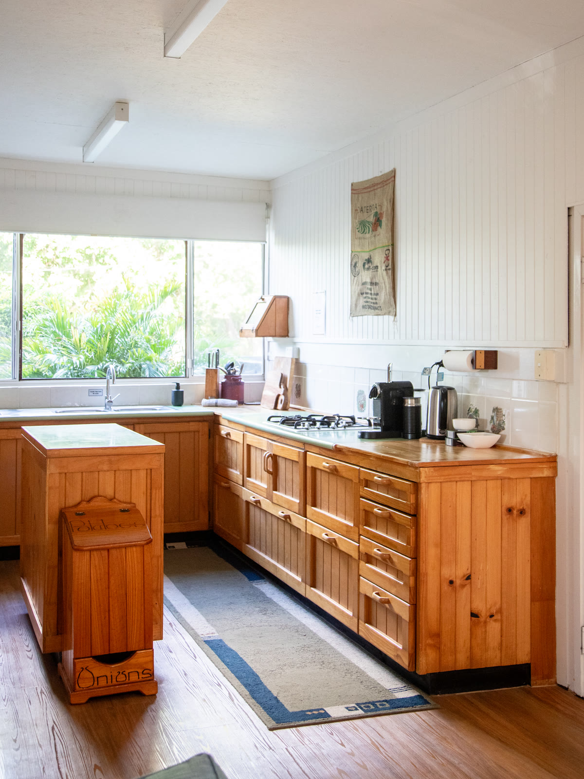 Guesthouse kitchen with timber cabinetry