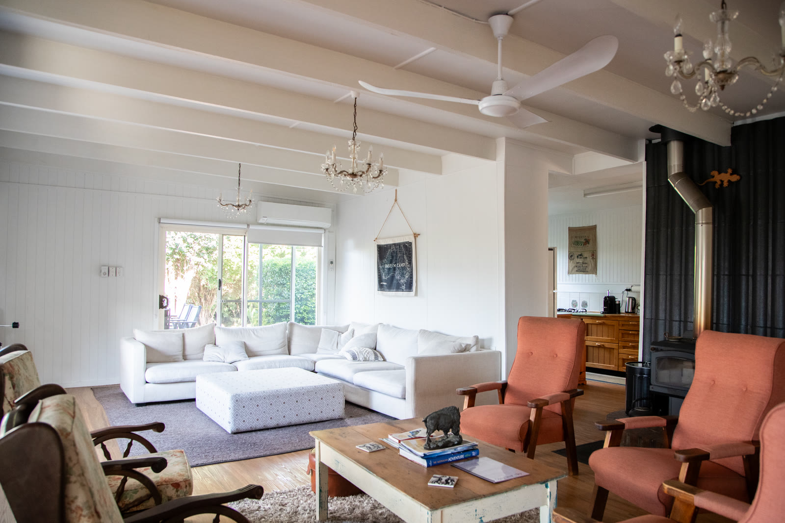 Guesthouse living room with lounges and fireplace